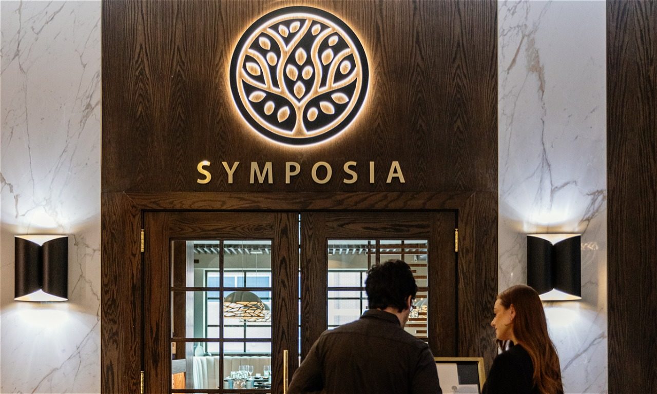 Symposia front and signage